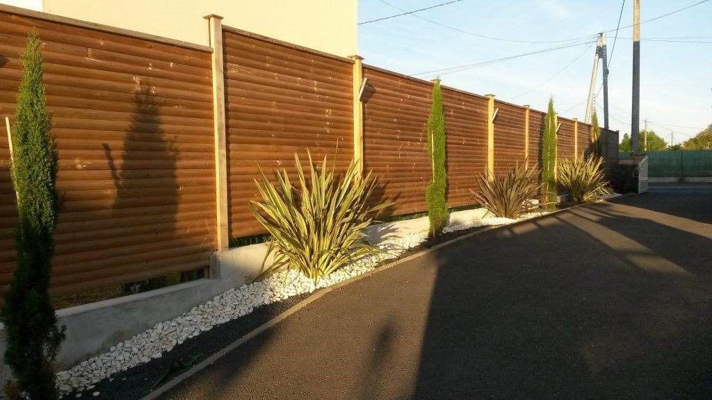 Clôture bois en demi rondins